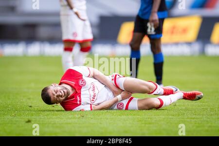 Valon BERISHA (D) with Pain on ground, Soccer 1. Bundesliga, 26. matchday, Fortuna Dusseldorf (D) - SC Paderborn 07 (PB) 0: 0, on May 16, 2020 in Duesseldorf/Germany. Photo: Moritz Mvºller/Pool via PHOTO AGENCY SVEN SIMON For journalistic purposes only! Only for editorial use! ## Gemvssvu the requirements of the DFL Deutsche Fuvuball Liga, it is prohibited to use or have in the stadium and/or photos taken from the game in the form of sequence pictures and/or video-like photo series. DFL regulations prohibit any use of photographs as image sequences and/or quasi-video ## ¬ | usage wor Stock Photo