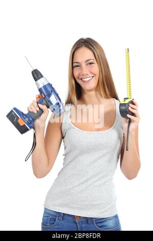 Beautiful woman holding a power drill and a tape measure isolated on a white background Stock Photo