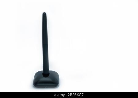 Wireless pen mouse on stand for using with computer, side and front on isolated white background. Stock Photo