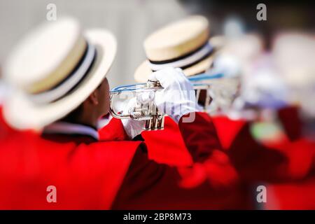 Brass Band in red uniform performing Stock Photo