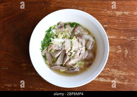 Top view Khanom Chin Nam Ngeaw, Rice noodles or Thai North East local noodle made from fermented rice flour with pork soup. Delicious local food for s Stock Photo