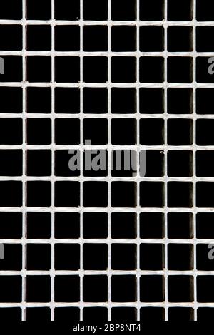 Detail of the concrete backdrop with small square holes Stock Photo