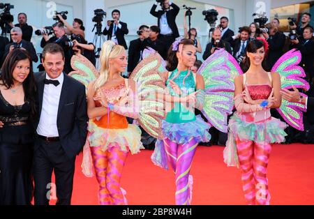 VENICE, ITALY - AUGUST 27: Iginio Straffi and Joanne Lee attend the Opening Ceremony and 'Birdman' premiere during the 71st Venice Film Festival Stock Photo