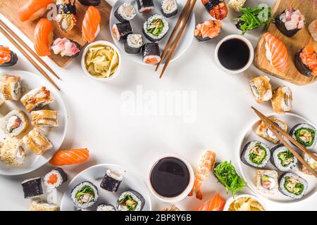Japanese food. Big sushi set. Assorted set of various sashimi, maki and sushi rolls with different fillings - tuna, sea bass, salmon, shrimp, vegetabl Stock Photo