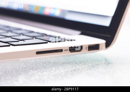 Side panel of computer laptop show with USB, HDMI and multi Card reader connector. Stock Photo