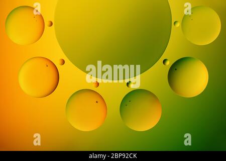 Multicolored decorative circles on bright gradient background. Stock Photo