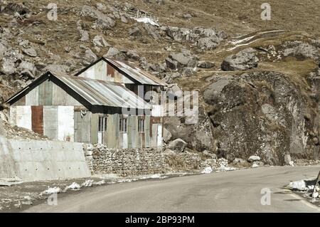 View of Military camp on a highway road side to Nathula Pass of India China border near Nathu La mountain pass in the Himalayas which connects Indian Stock Photo