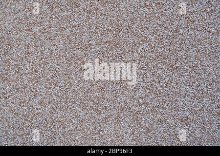 close view of the wall surface, decorative finishing, heat insulation granules or granite particles Stock Photo