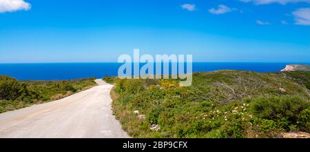 Mediterranean sea as seen from the road leading towards the coast and shore on Zante Island, Greece Stock Photo