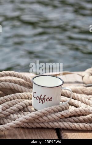 Wooden jetty on a blue sea Coffee Mug