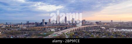 A dramatic sunrise over the urban city center of Clevland Ohio Stock Photo