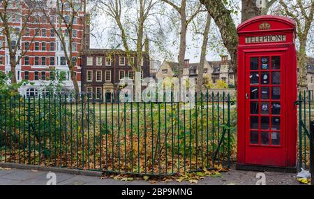 London, UK: Dec 2, 2017: A classic, and relatively rare, K2 telephone box stands on the south side of Charterhouse Square. The original version of the Stock Photo