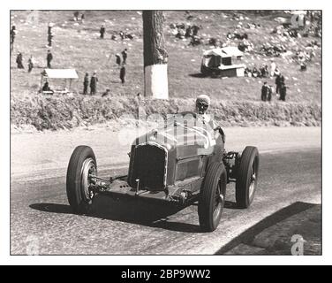 MONZA Archive 1930's Nuvolari The winning Alfa Romeo Tipo B made its victorious debut on June 5, 1932 at the Italian Grand Prix at Monza. With Tazio Nuvolari and Rudolfо Caracciola behind the wheel, the Italian company was dominating throughout the entire season, also winning the French and German Grand Prix. Stock Photo