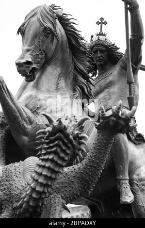 Berlin / Germany - February 18, 2017: Statue of St. George slaying the Dragon in historic Nikolaiviertel district in Mitte, Berlin, Germany Stock Photo
