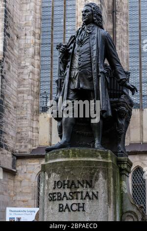 Leipzig / Germany - February 24, 2017: New Bach monument in Leipzig, Statue of Johann Sebastian Bach in front of the St. Thomas Church (Thomaskirche) Stock Photo