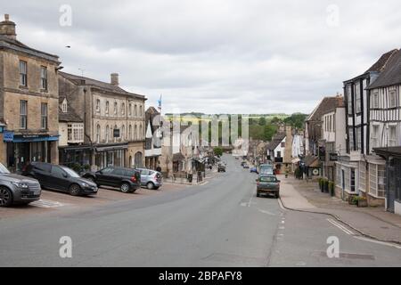 Shops and hotels on the High Street in Burford, Oxfordshire, UK Stock Photo