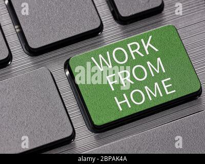 Work from home key on computer keyboard warning message concept Stock Photo