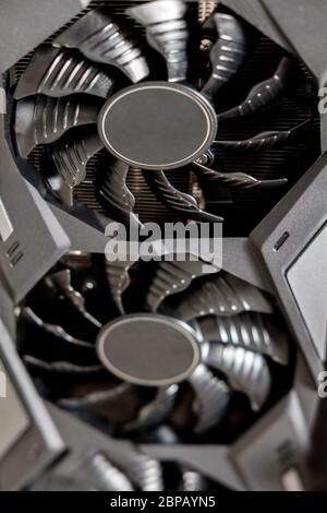 Man repairs a computer system unit, changes parts, video card and hard drive. Computer Repair Wizard Stock Photo