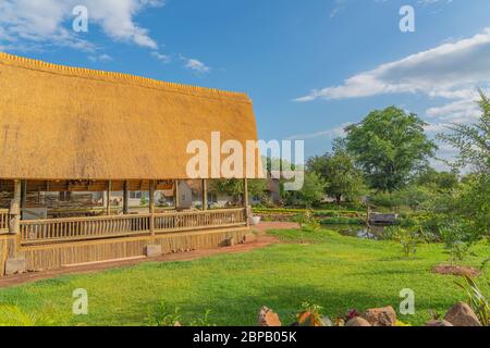 Hwange / Zimbabwe - February 4 2020: The buildings from the Shearwater Explorers Village Hotel at the Victoria Waterfalls Stock Photo