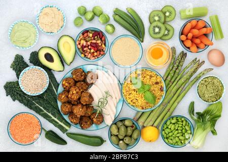 Healthy super food collection with foods high in antioxidants, vitamins, minerals, protein, smart carbs, omega 3 and fiber. Flat lay. Stock Photo