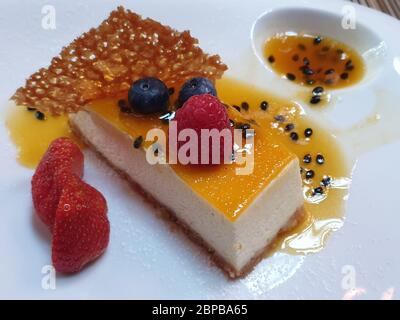 Cheesecake with berries in the plate Stock Photo