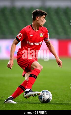 Bremen, Germany. 18th May, 2020. Soccer, Bundesliga, 26th matchday, Werder Bremen - Bayer Leverkusen at wohninvest Weser Stadium. Leverkusen's Kai Havertz runs with the ball. Credit: Stuart Franklin/Getty-Pool/dpa - IMPORTANT NOTE: In accordance with the regulations of the DFL Deutsche Fußball Liga and the DFB Deutscher Fußball-Bund, it is prohibited to exploit or have exploited in the stadium and/or from the game taken photographs in the form of sequence images and/or video-like photo series./dpa/Alamy Live News Stock Photo