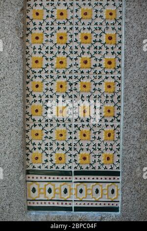 Traditional old tiles wall, painted tin-glazed, azulejos ceramic tilework in Porto, Portugal. Stock Photo