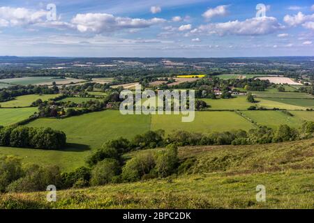 View from Harting Down National Trust Nature Reserve towards East Harting village and surrounding countryside as seen from , West Sussex, England, UK