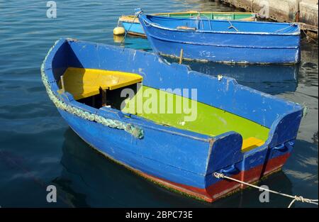 Colourful boats float in the harbour of Marsaxlokk, a traditional fishing village on the southeast coast of the main island of Malta.