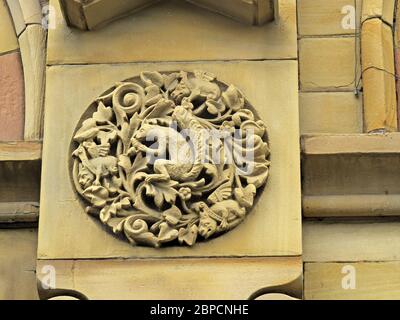 Listed building,51 Station Road, Batley, West Yorkshire, England, elaborate carvings Monkeys, sheeps head,dog,owl,eagle,macaw,bat Stock Photo