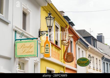 Moers, Germany - April 26, 2019: facades with shop signs in the old town of Moers. Moers is a district belonging city in the Lower Rhine Region of Ger Stock Photo
