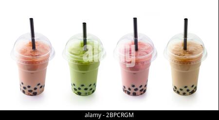 colorful iced bubble tea in plastic take away cups isolated on white background Stock Photo