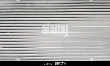 Gray Corrugated metal or zinc texture surface or galvanize steel in the vertical line background or texture Stock Photo