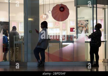 Customers enter Pandora Jewelry Store 