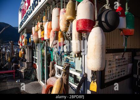 Garibaldi, Oregon, USA, August, 8, 2019, Port of Garibaldi on the Pacific Ocean, Fish store called the Spot with antique buoys hanging from the roof Stock Photo