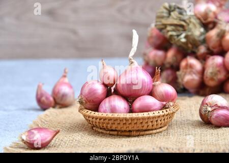 Premium Photo  Shallots or red onion purple shallots on basket fresh  shallot for medicinal products or herbs and spices thai food made from this  raw shallot