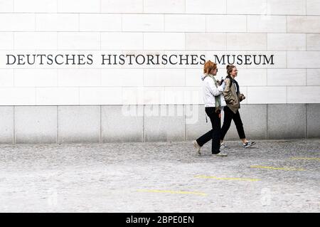 Berlin, Germany. 18th May, 2020. Two women walk into the German Historical Museum in Berlin, capital of Germany, May 18, 2020, which marks the International Museum Day. According to the agreement of Germany's federal and state governments on April 30, museums and galleries in Germany are accessible again but hygiene and distance rules must continue to be observed. Credit: Binh Truong/Xinhua/Alamy Live News Stock Photo