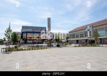 Hoyerswerda, Germany. 18th May, 2020. The Lausitzer Platz is the centre of the Saxon city of Hoyerswerda in the district of Bautzen. Here, life before it takes place at the fountain and in the adjacent Lausitzhalle or in the shopping mile of the Lausitz-Center. Credit: Daniel Schäfer/dpa-Zentralbild/Daniel Schäfer/dpa/Alamy Live News Stock Photo