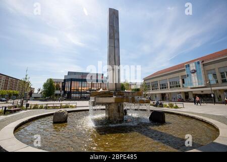 Hoyerswerda, Germany. 18th May, 2020. The Lausitzer Platz is the centre of the Saxon city of Hoyerswerda in the district of Bautzen. Here, life before it takes place at the fountain and in the adjacent Lausitzhalle or in the shopping mile of the Lausitz-Center. Credit: Daniel Schäfer/dpa-Zentralbild/Daniel Schäfer/dpa/Alamy Live News Stock Photo