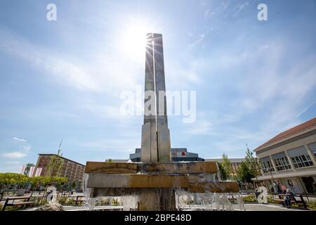 Hoyerswerda, Germany. 18th May, 2020. The Lausitzer Platz is the centre of the Saxon city of Hoyerswerda in the district of Bautzen. Here, life before it takes place at the fountain and in the adjacent Lausitzhalle or in the shopping mile of the Lausitz-Center. Credit: Daniel Schäfer/dpa-Zentralbild/Daniel Schäfer/dpa/Alamy Live News Stock Photo