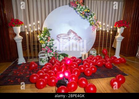 Red heart balloons . light candlesticks . Engagement and wedding Balloon Decorations and events . Stock Photo