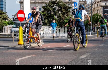 Bucharest/Romania - 05.16.2020: People riding bicycles on a bicycle lane in the center of Bucharest. People enjoying a nice day in the center of Bucha Stock Photo