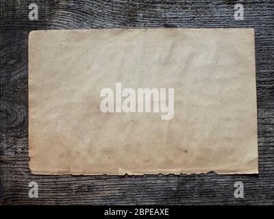 Stack old papers on a wooden table Stock Photo