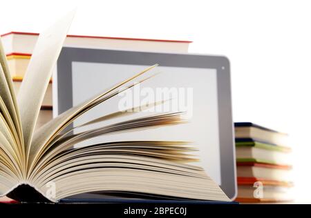 Composition with books and tablet computer isolated on white background Stock Photo