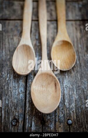 Wood spoon over a wood table Stock Photo