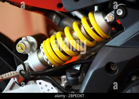 Color shot of a motorcycle shock absorber Stock Photo - Alamy