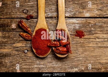 Wood spoon with condiments Stock Photo