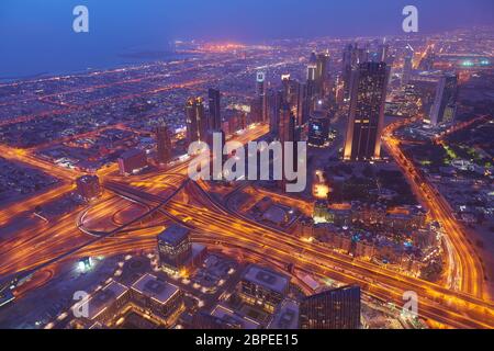 Dubai night skyline. Dubai streets by night. Al Yaqoub tower Dubai. Dubai Millennium Plaza. Dubai Sheikh Zayed Road by night. Dubai night view. Dubai Stock Photo