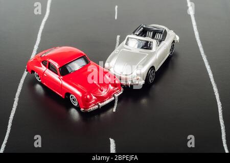 toy car crashed on a road Stock Photo