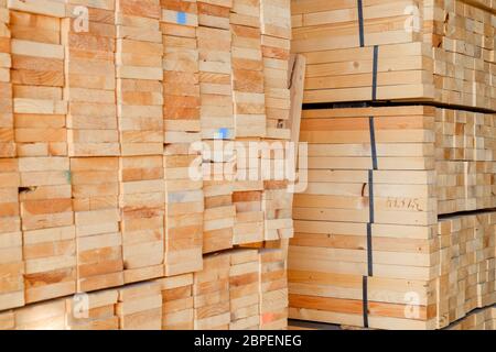 Close-up a group of industry wood processing (chamcha wood) material in warehouse for use on construction and make a furniture for decor home Stock Photo